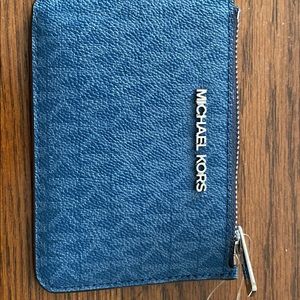 Blue Michael Kors travel wallet